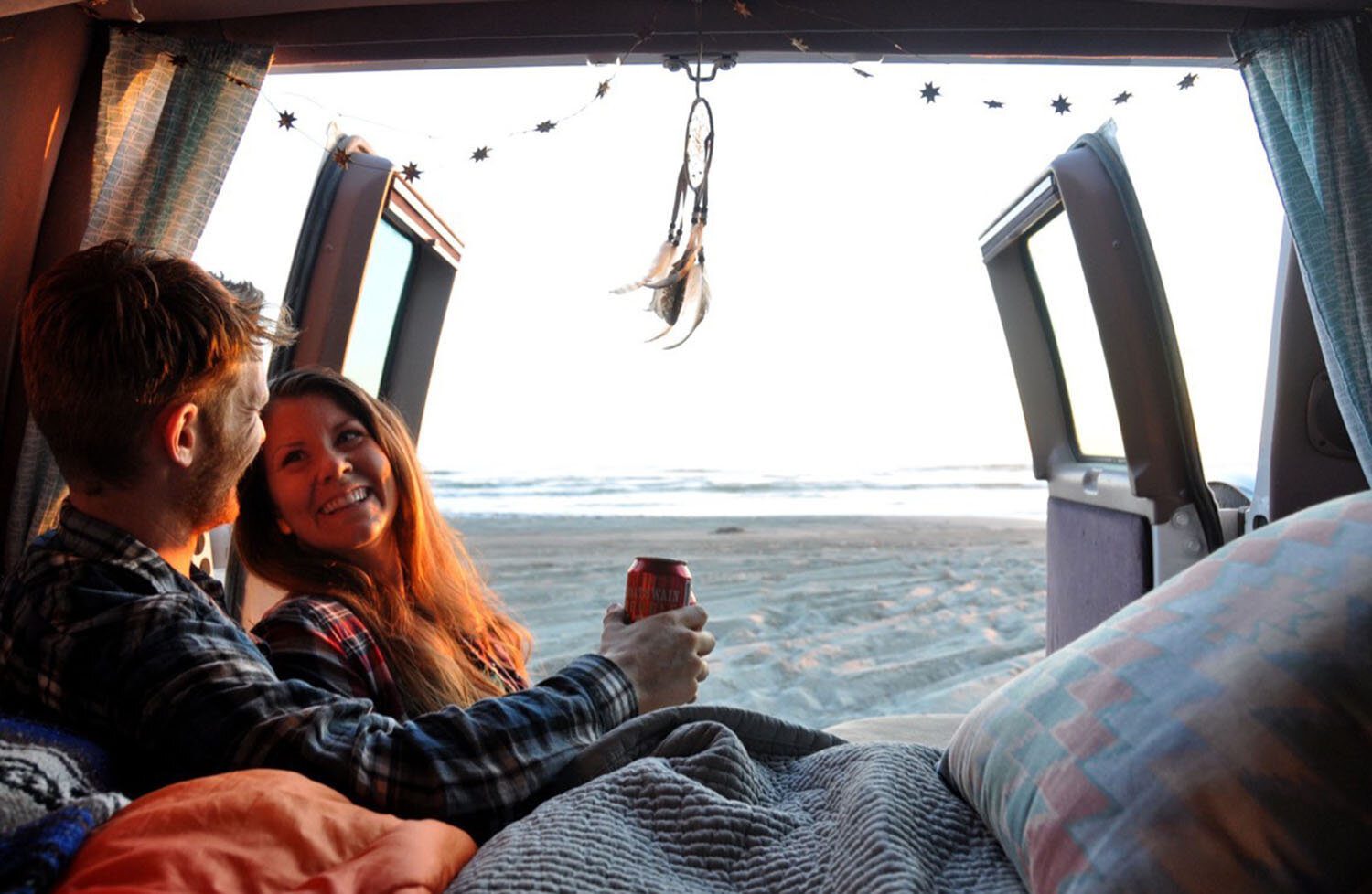 Campervan sunset at beach Katie and Ben